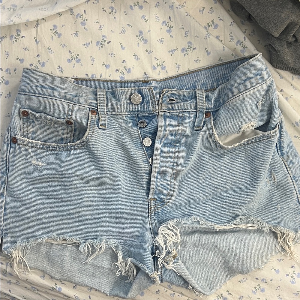 Levi’s Light Blue Distressed Denim Shorts